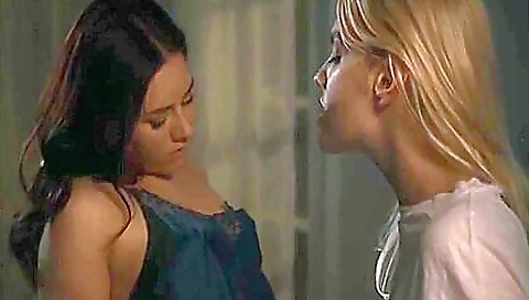 Mature lesbian fucks two hot girls with a strapon